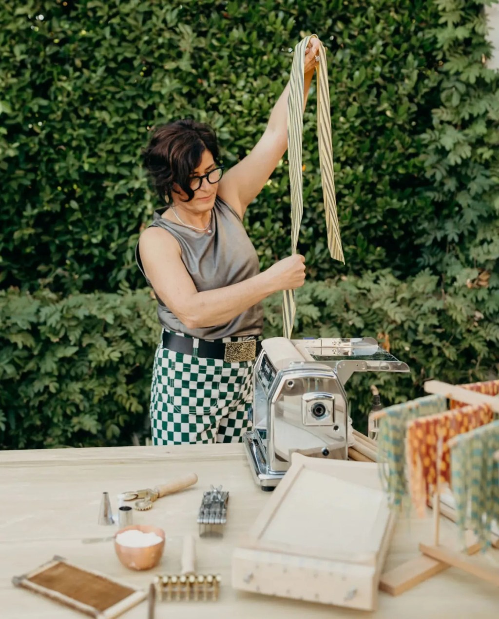 woman teaching a handmade pasta class during a bachelorette party