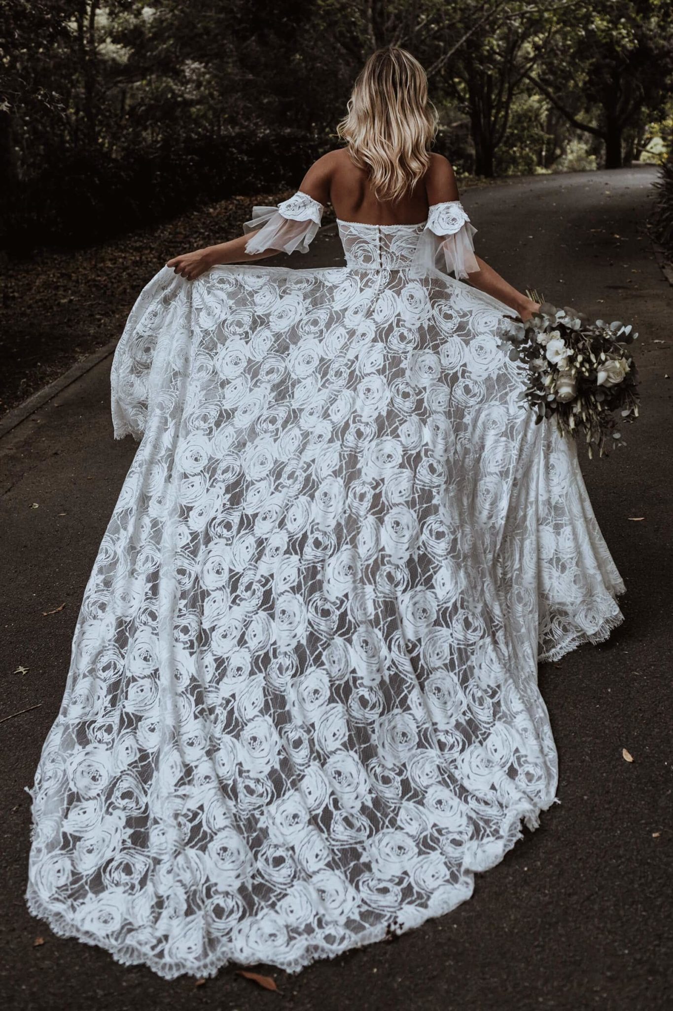 off shoulder corset style fitted bodice wedding dress with floral lace detailing