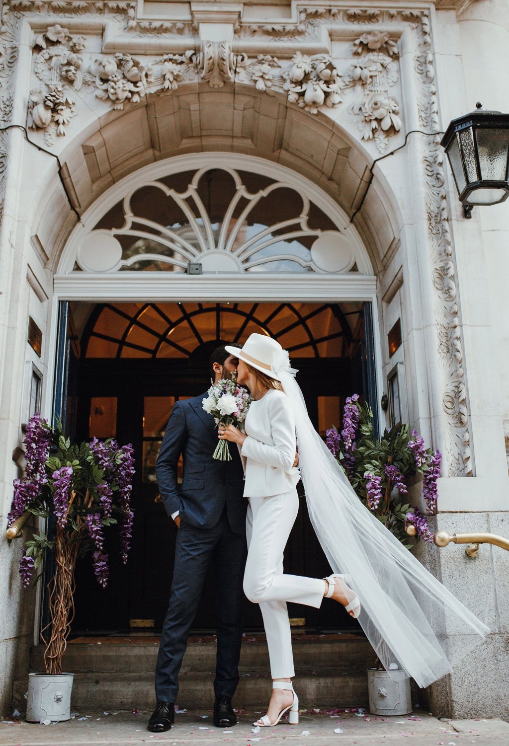 White wedding suit and hat for women