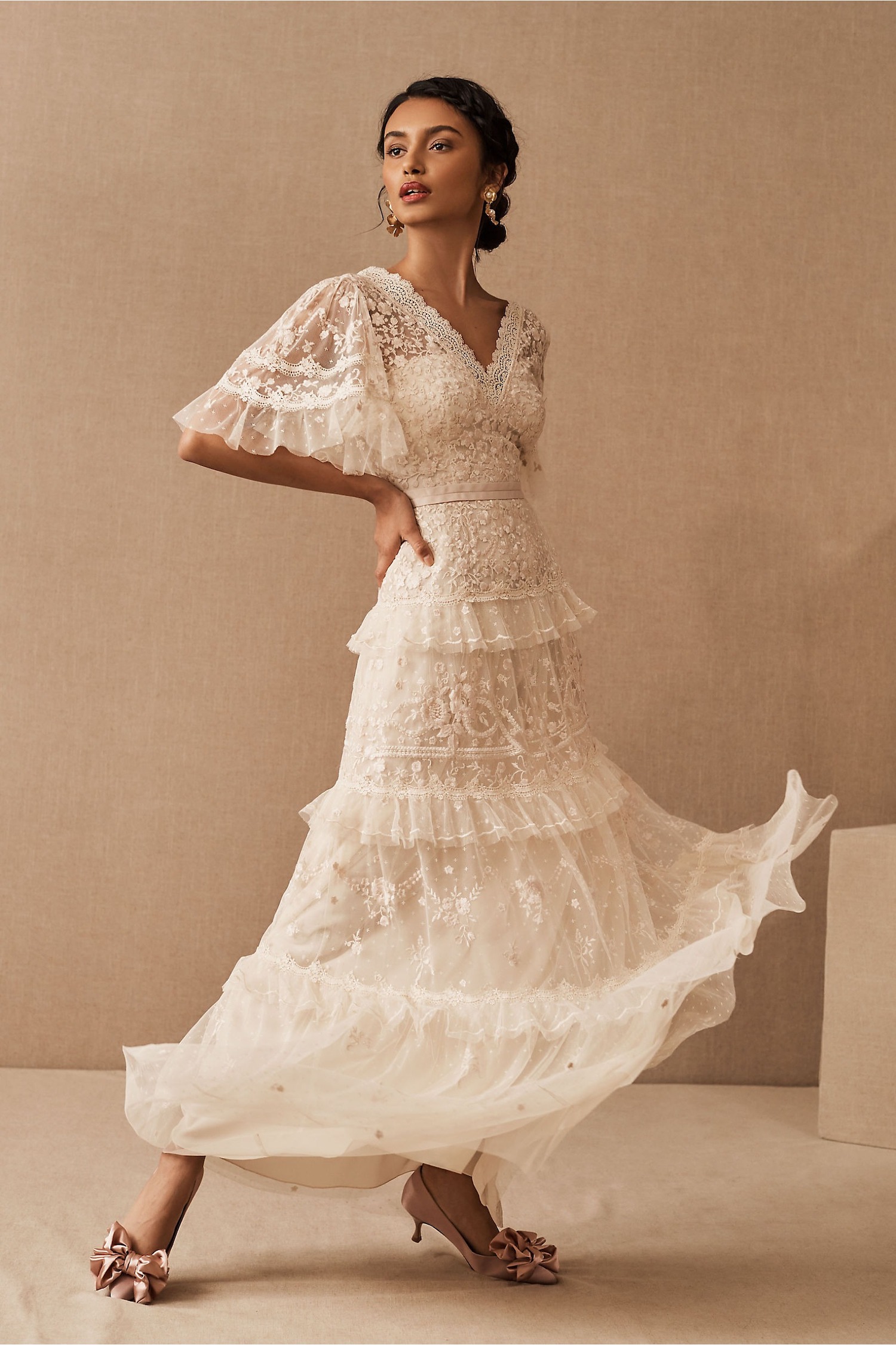 whimsically festive layered Needle and Thread wedding dresses